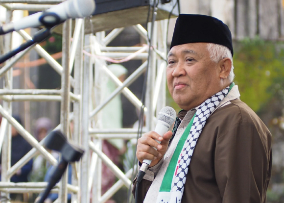KIAI DIN DAN MUHAMMADIYAH DI DESA, HARMONI TAJDID DAN TRADISI
