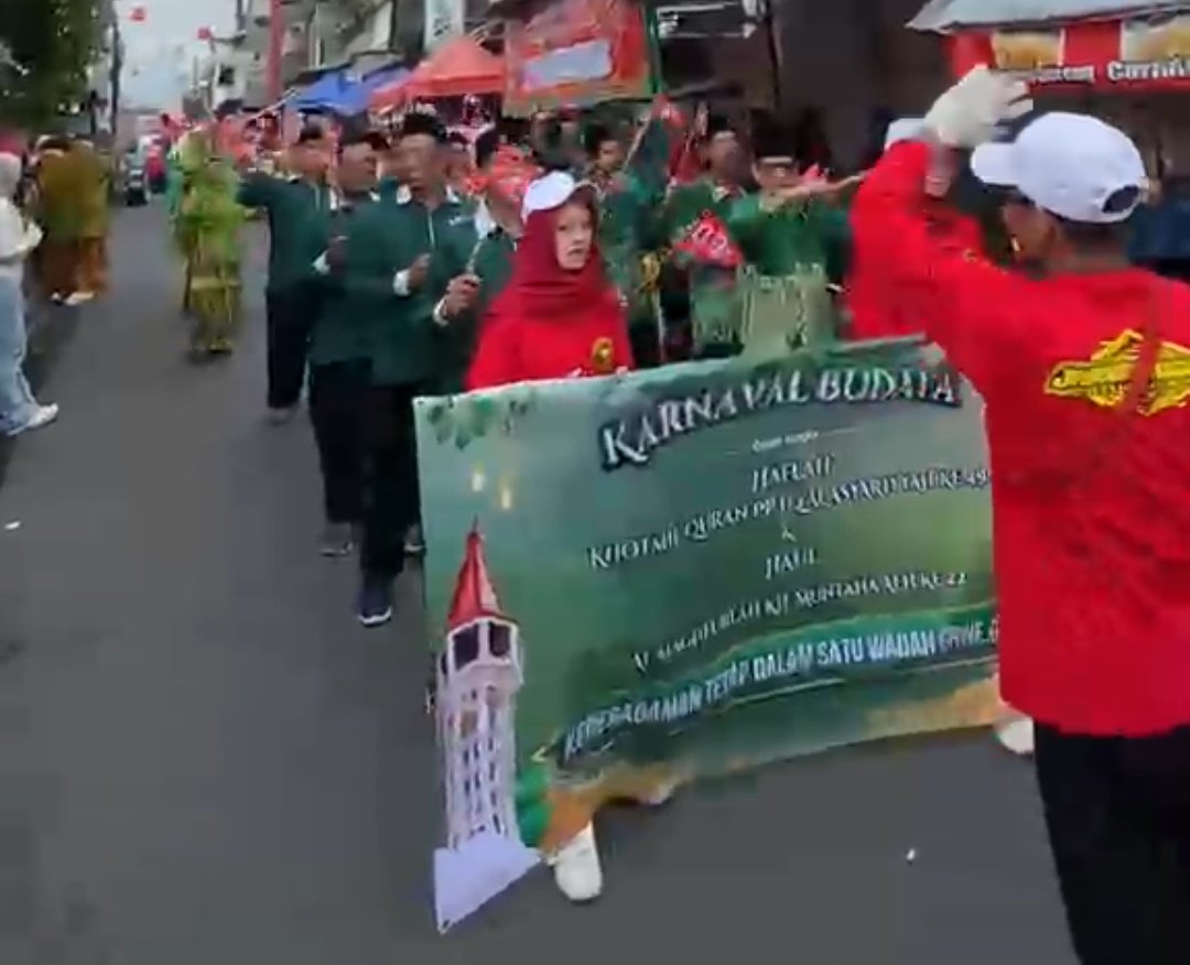 Wujudkan Ukhuwah Islamiyah, Sinergi KOKAM dan Banser Amankan Karnaval Budaya PPTQ Al-Asy'ariyyah Kalibeber - Gambar 5
